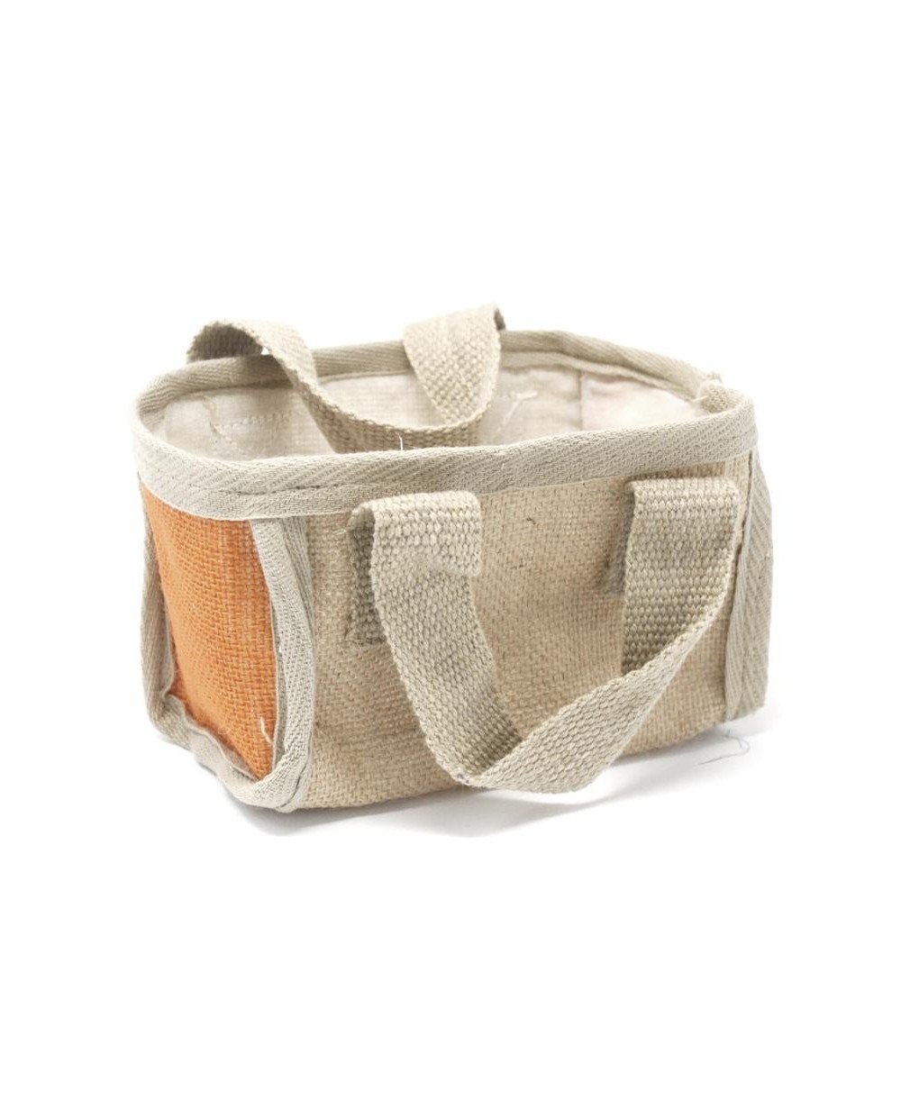 Cesta ecológica pequeña color naranja de yute y algodón para almacenamiento y decoración natural.