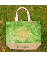 Textura artesanal de bolso ecológico verde de algodón y yute reutilizable.
