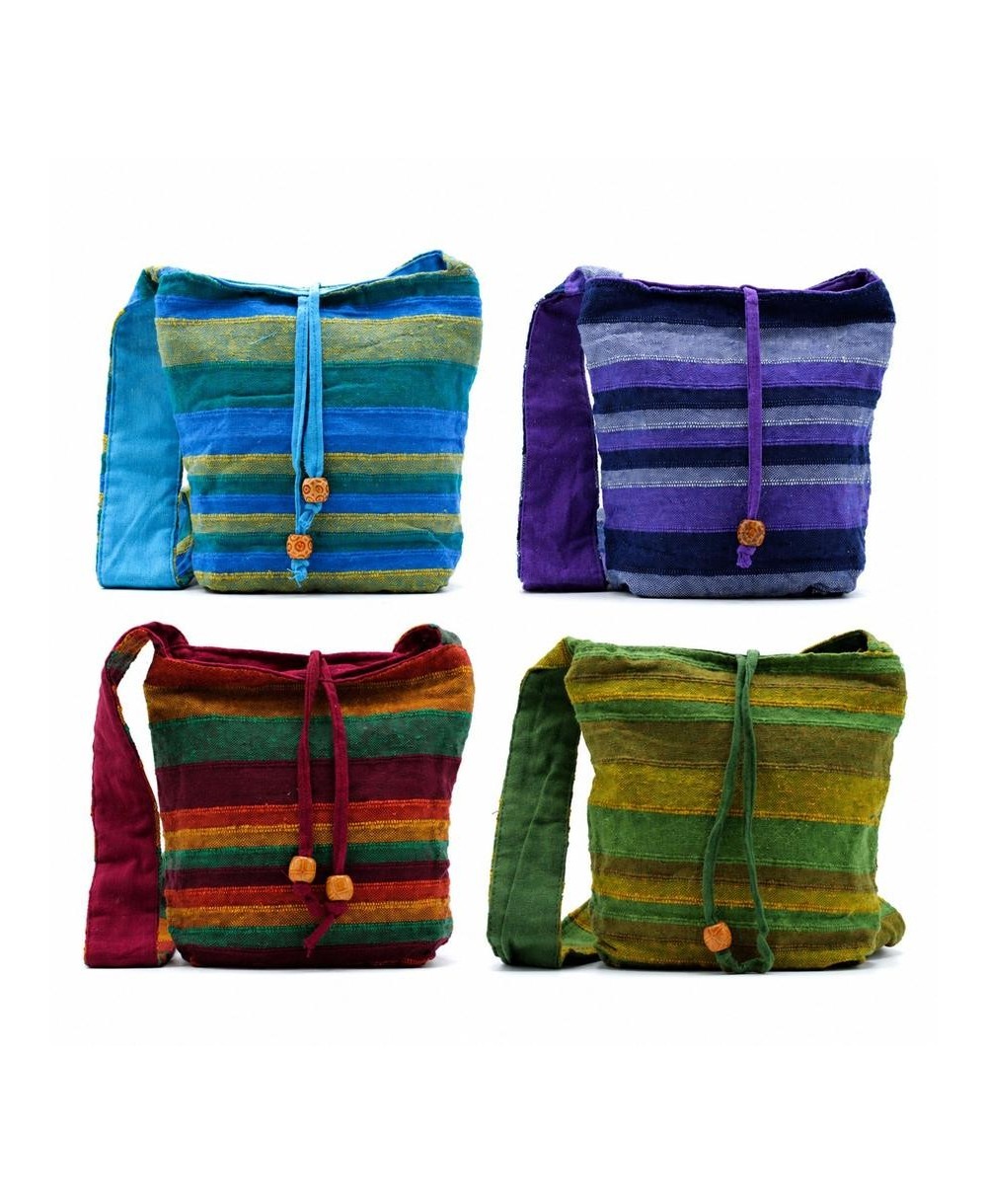 Bandolera artesanal de algodón con diseño étnico y colores inspirados en la naturaleza.