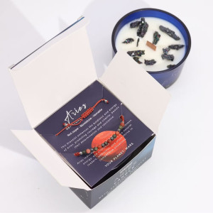 Interior del packaging de la vela energética del zodiaco Aries con pulsera incluida.