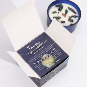 Interior del packaging de la vela energética del zodiaco Tauro con pulsera incluida.