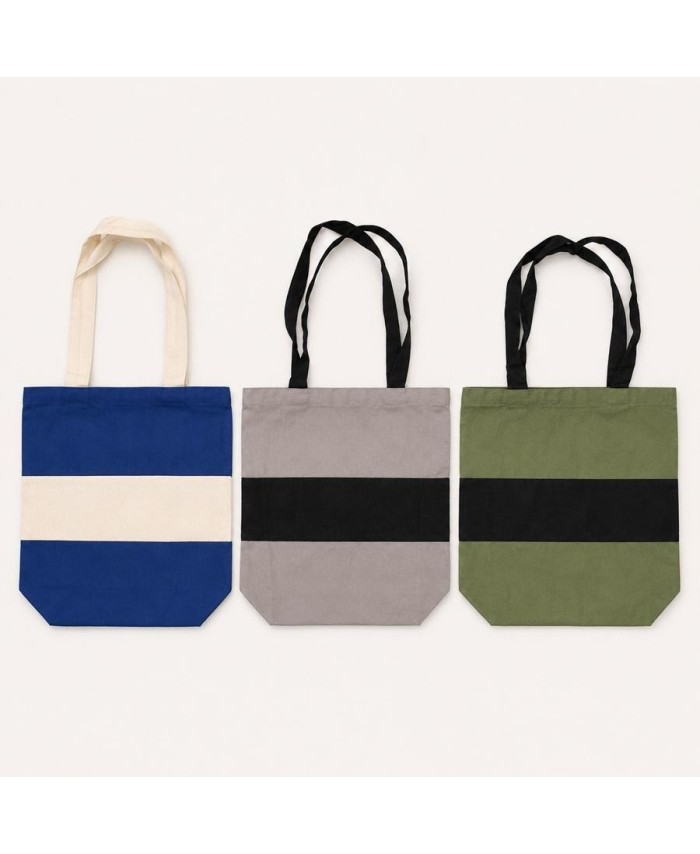 Colección de bolsas shopper bicolor disponibles en verde, azul y gris.