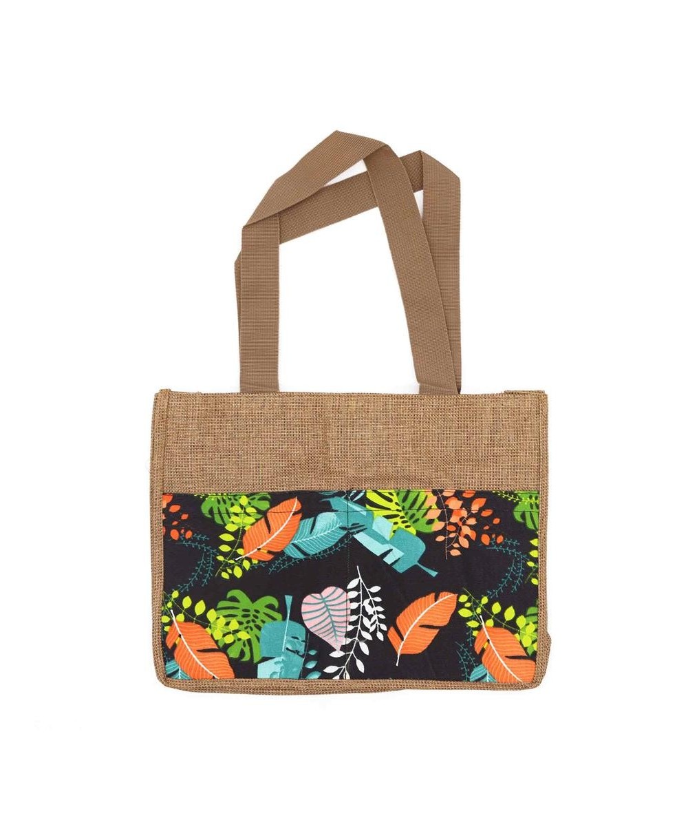 Bolsa reutilizable de yute natural con panel decorativo tropical para compras sostenibles.