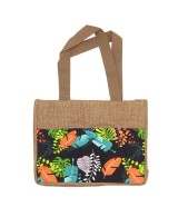 Bolsa reutilizable de yute natural con panel decorativo tropical para compras sostenibles.