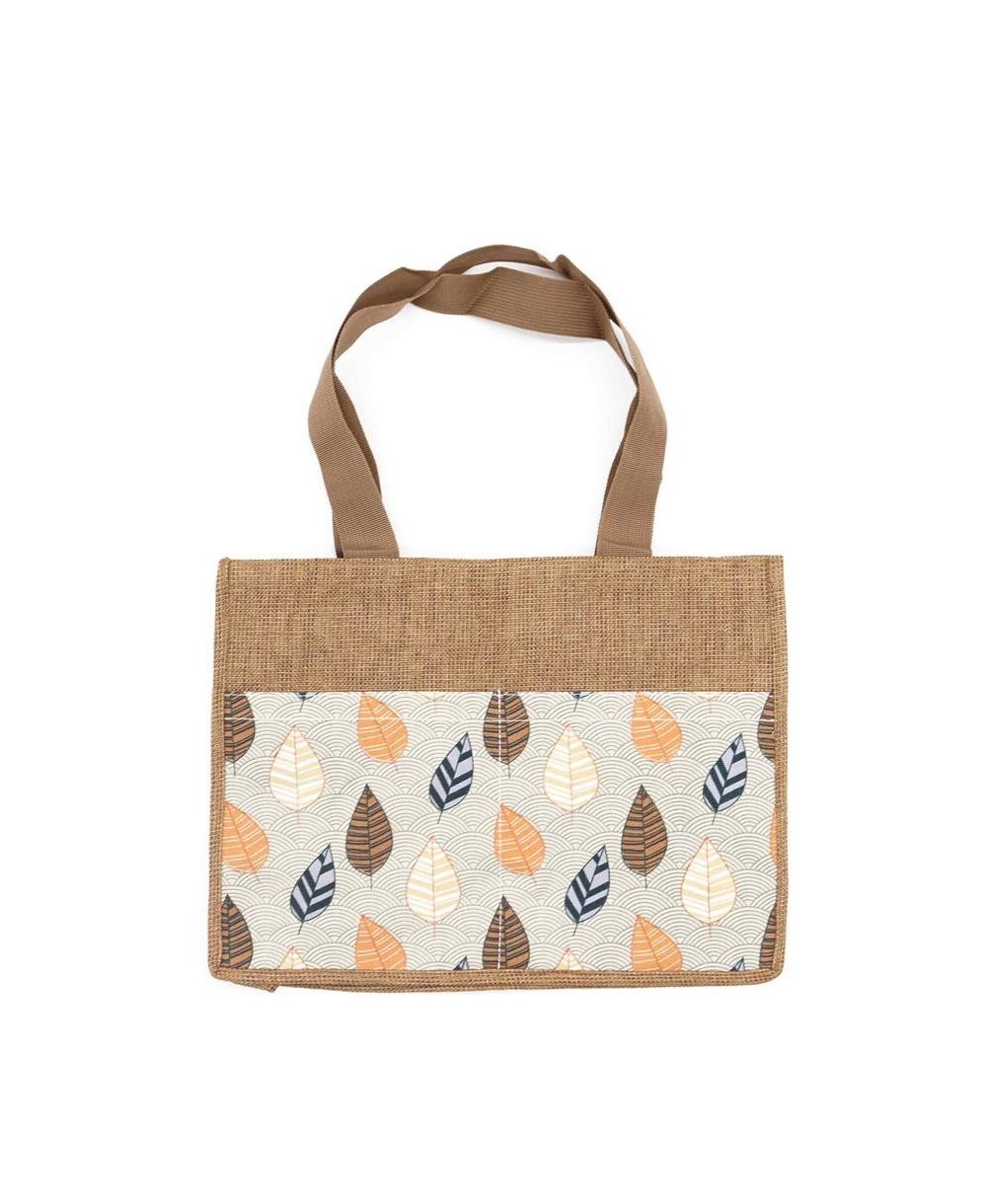 Bolsa de yute natural con estampado de hojas tropicales para transporte diario.