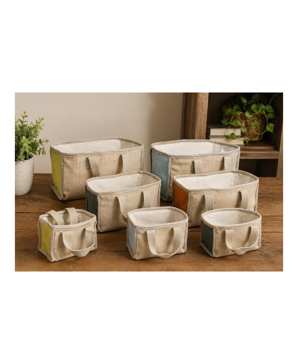 Cesta ecológica de yute y algodón con asas para organización y decoración natural.