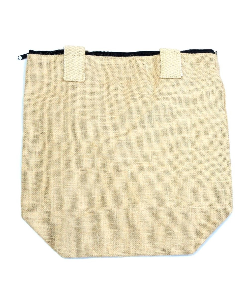 Textura de tejido de yute natural en bolso ecológico reutilizable de estilo rústico.