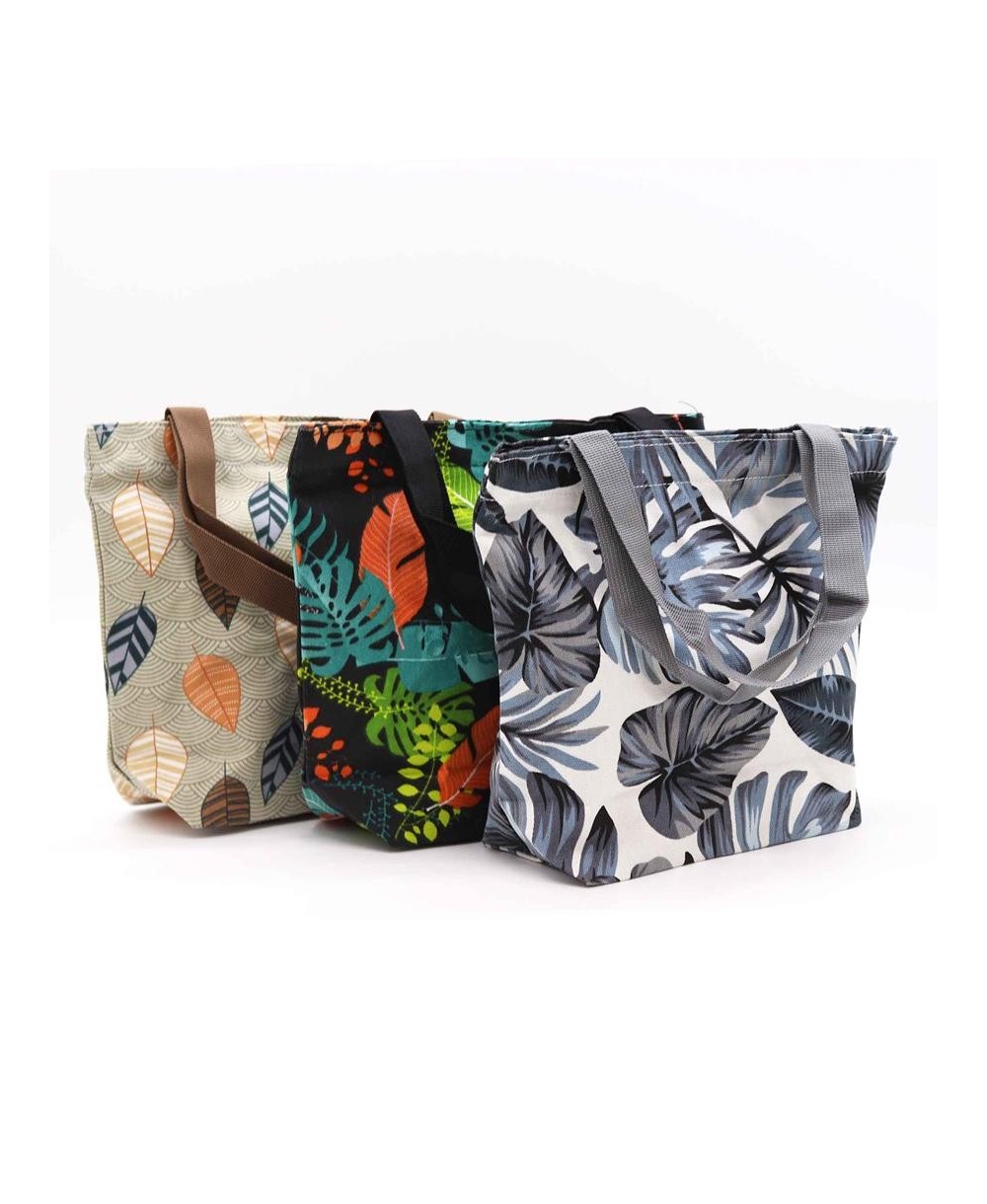 Bolsas tropicales reutilizables con estampados de hojas para compras y uso cotidiano.
