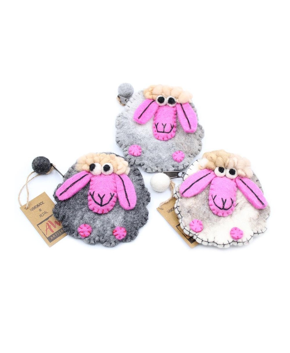 Monederos artesanales de ovejita enviados aleatoriamente según disponibilidad de stock.