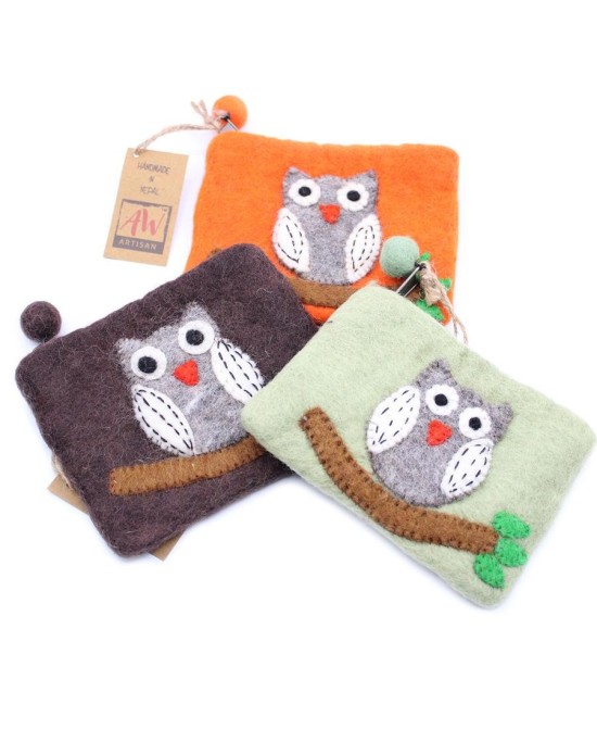 Monederos artesanales de búho enviados aleatoriamente según disponibilidad de stock.