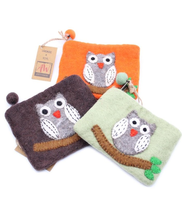Monederos artesanales de búho enviados aleatoriamente según disponibilidad de stock.