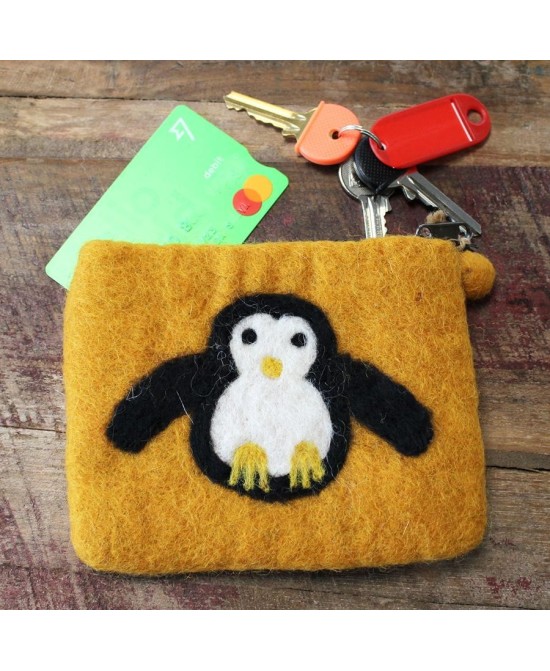 Monedero de fieltro con pingüino para monedas y pequeños accesorios.