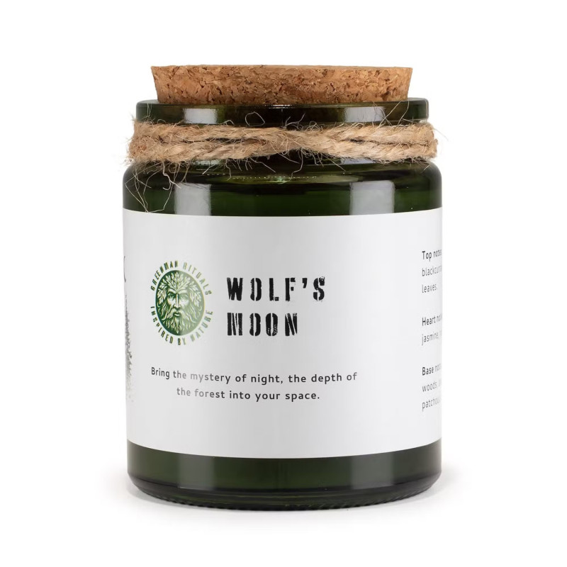 Vela de soja aroma bosque nocturno en frasco de vidrio verde con tapa de corcho.