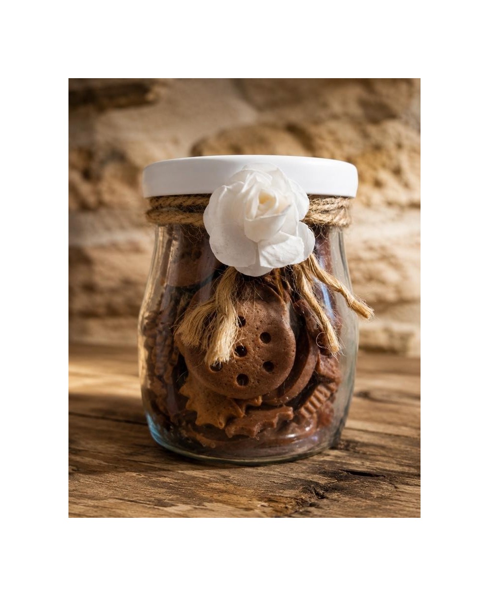 Presentación de mini galletas de cera de soja perfumada en tarro decorativo reutilizable.