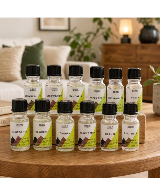 Colección de aceites de fragancia frutales con diferentes aromas para difusores.
