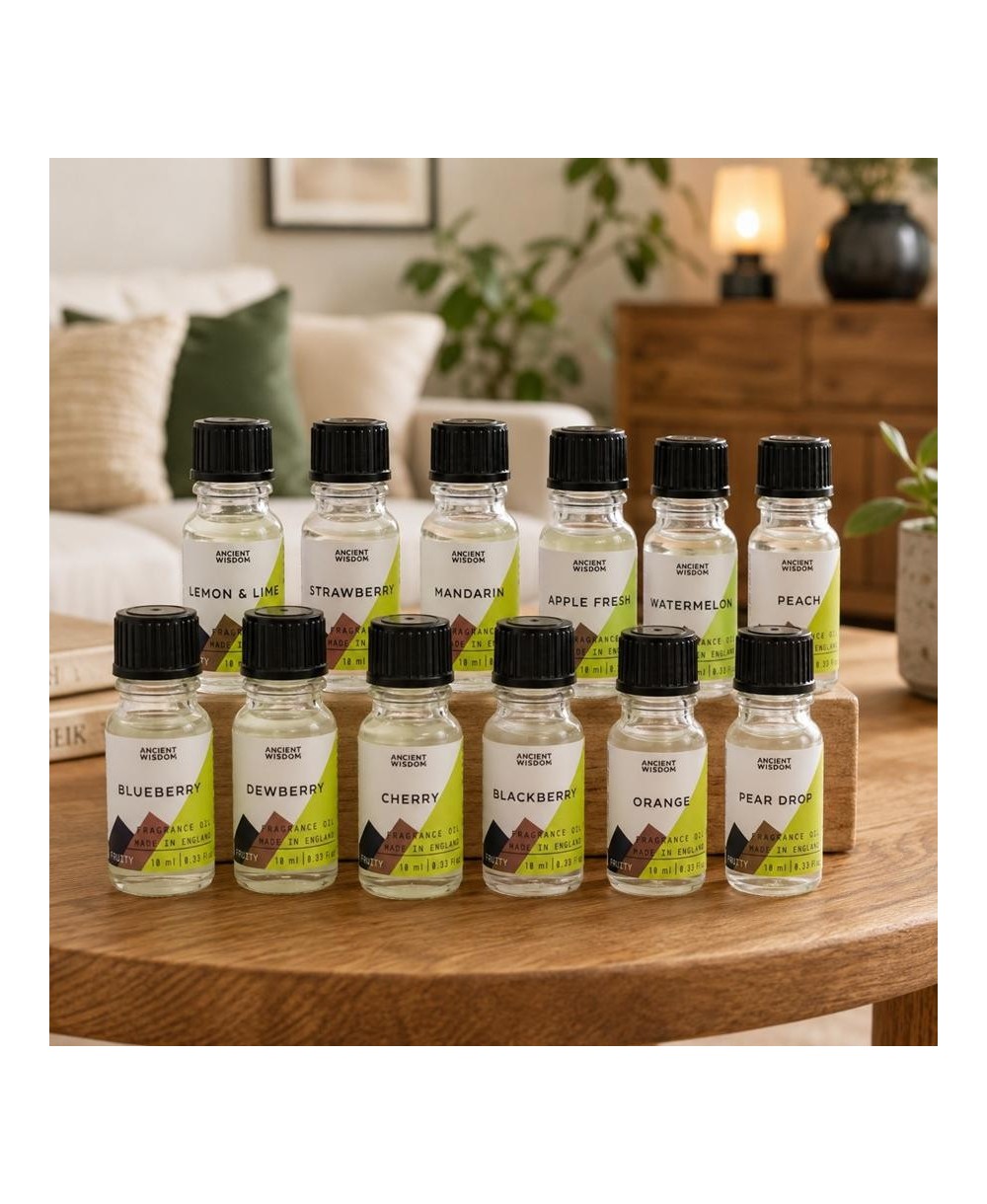 Colección de aceites de fragancia frutales con diferentes aromas para difusores.