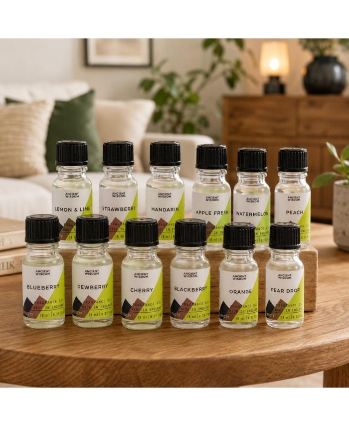 Colección de aceites de fragancia frutales con diferentes aromas para difusores.