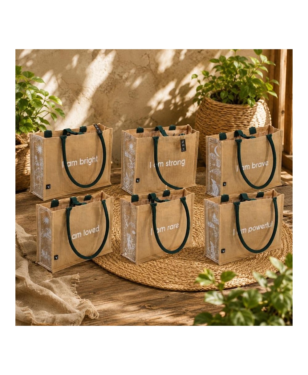 Bolsa grande de yute ecológica con mensajes inspiracionales, asas resistentes y diseño natural.
