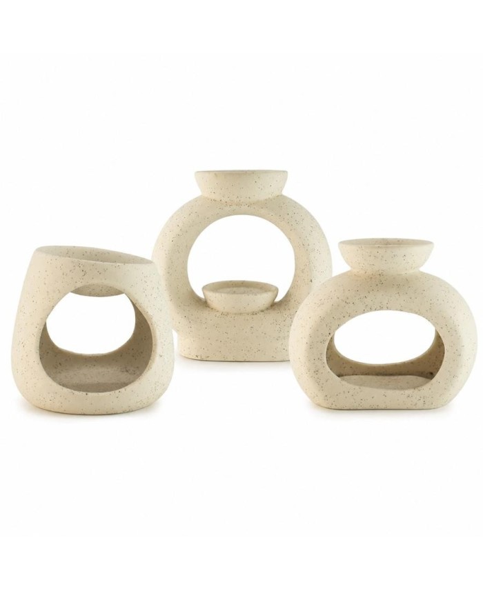 Quemador de aceite de cerámica blanco moteado con 3 diseños disponibles para aceites esenciales y ceras.
