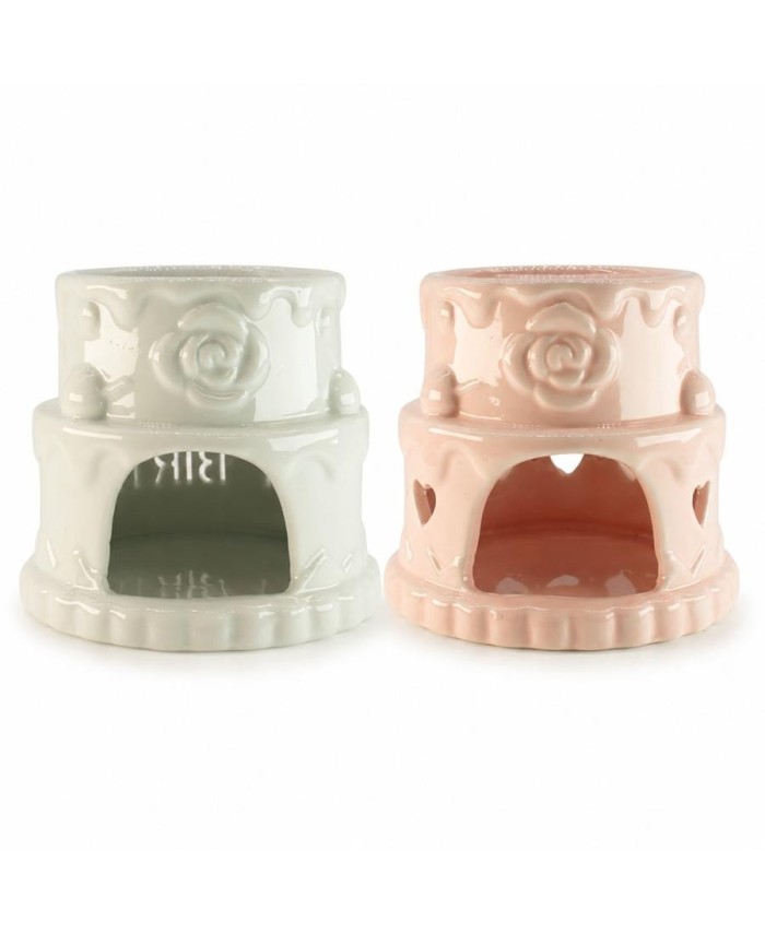 Quemador de aceite de cerámica rosa con forma de pastel para aceites esenciales y ceras aromáticas.