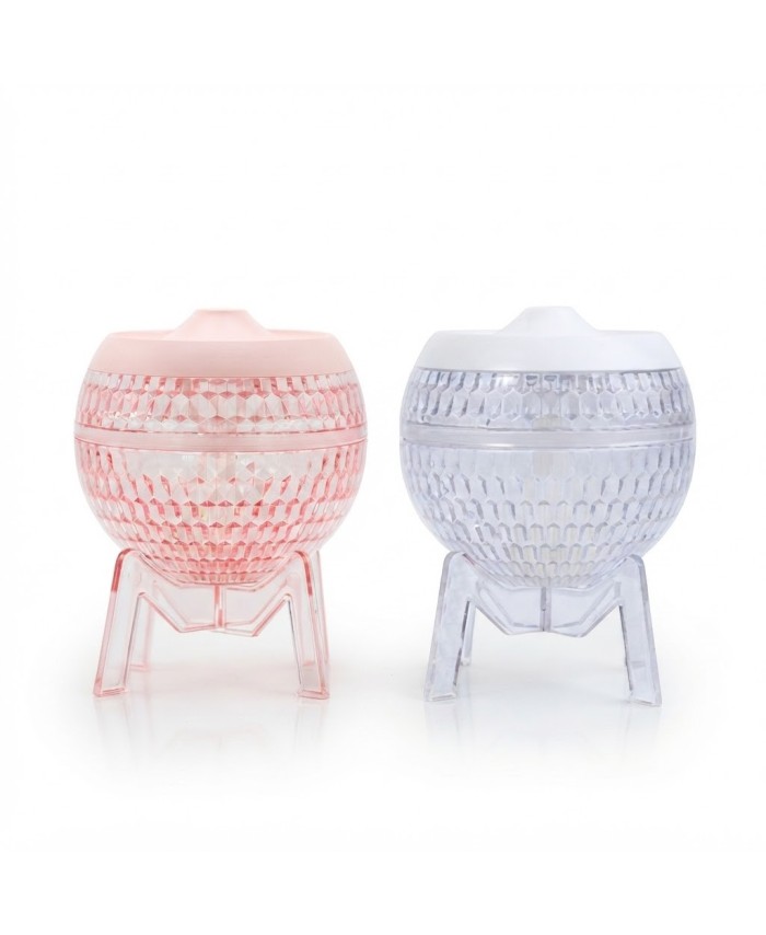 Difusor de aromas USB rosa con diseño transparente y luz LED para aceites esenciales.