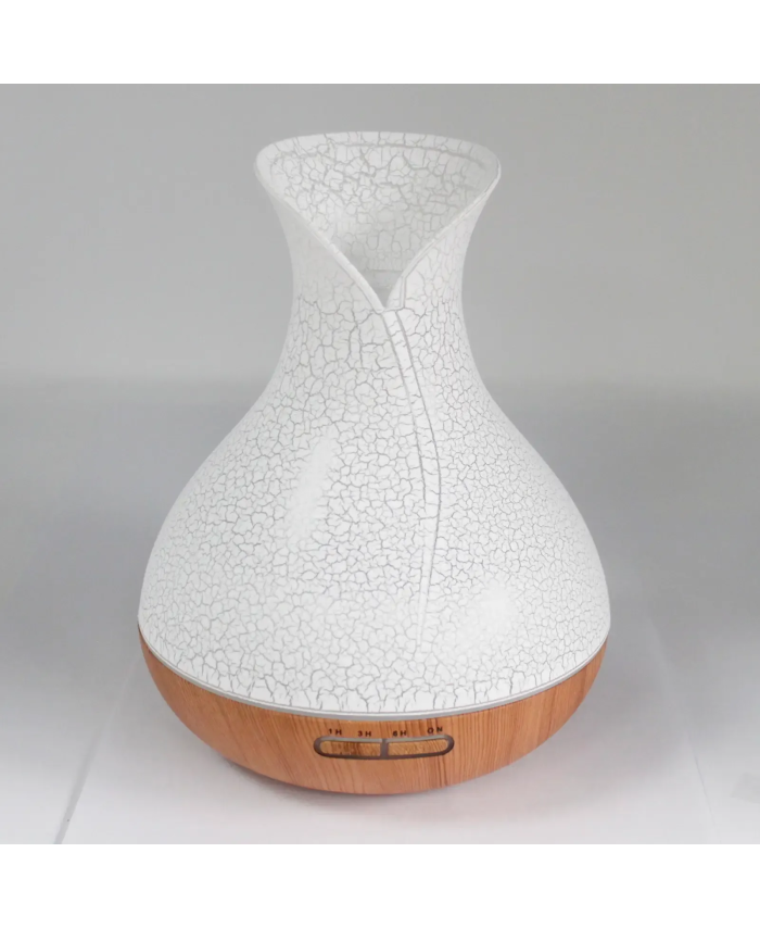 Difusor de aromas Palma USB con acabado efecto concha y base efecto madera.