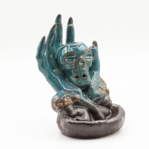 Quemador incienso cascada calavera en mano
