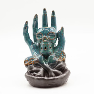Quemador incienso cascada calavera en mano