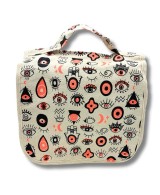 Bolsa organizadora de lona de algodón con estampado de ojos múltiples para accesorios y artículos personales.
