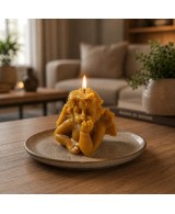Vela de angelito encendida.