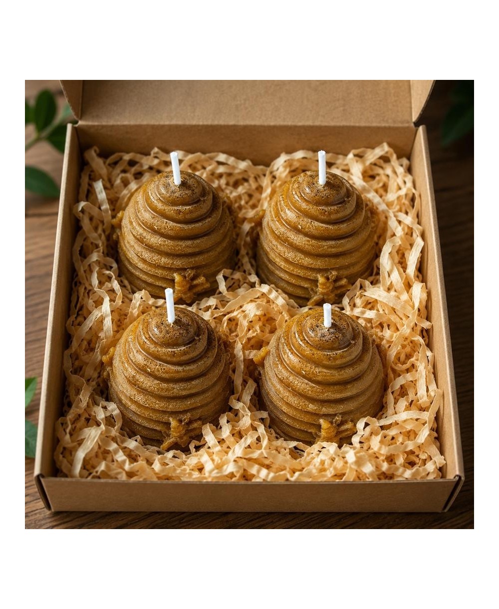 Pack de cuatro velas colmena elaboradas con cera de abeja natural para decoración.