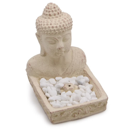 Portaincienso con figura de buda y base con piedras para conos o varillas.