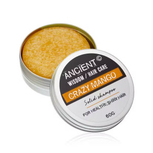 champú sólido de mango presentado en formato compacto dentro de lata.