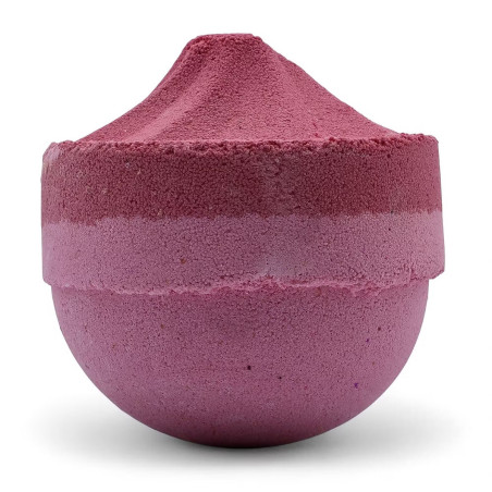 Bomba de baño efervescente Razzle Dazzle con textura compacta, diseñada para crear un baño aromático, espumoso y relajante.