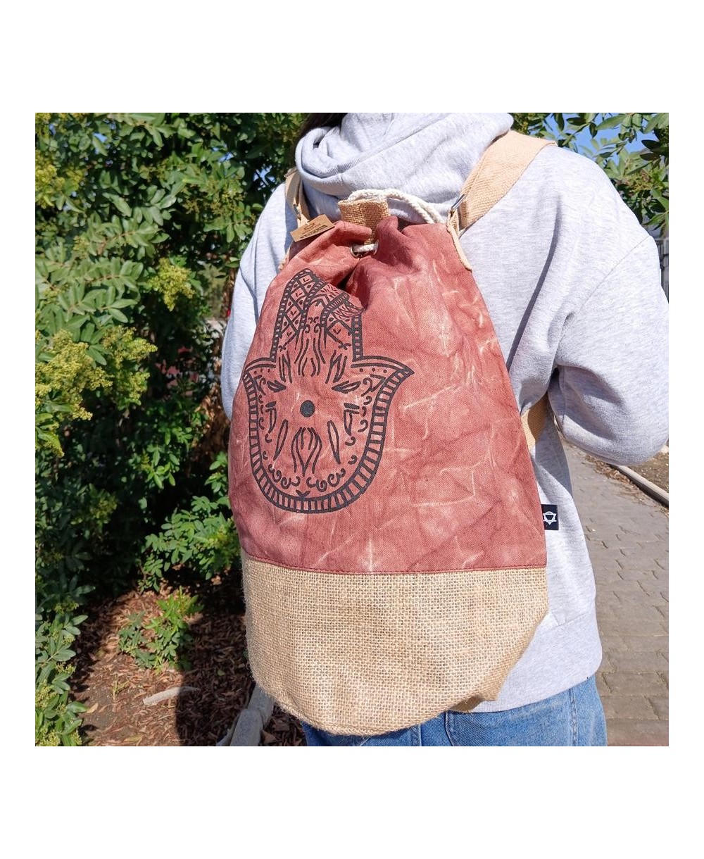 Mochila sostenible con símbolos decorativos místicos